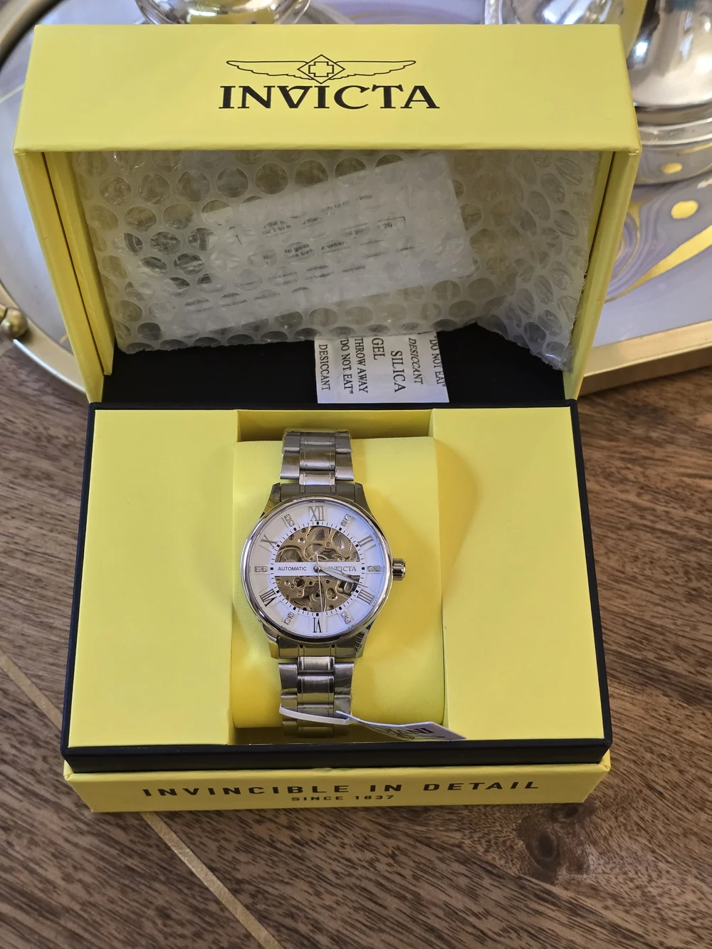 Invicta Men's Silver Skeleton Dial Automatic Watch with White Accents